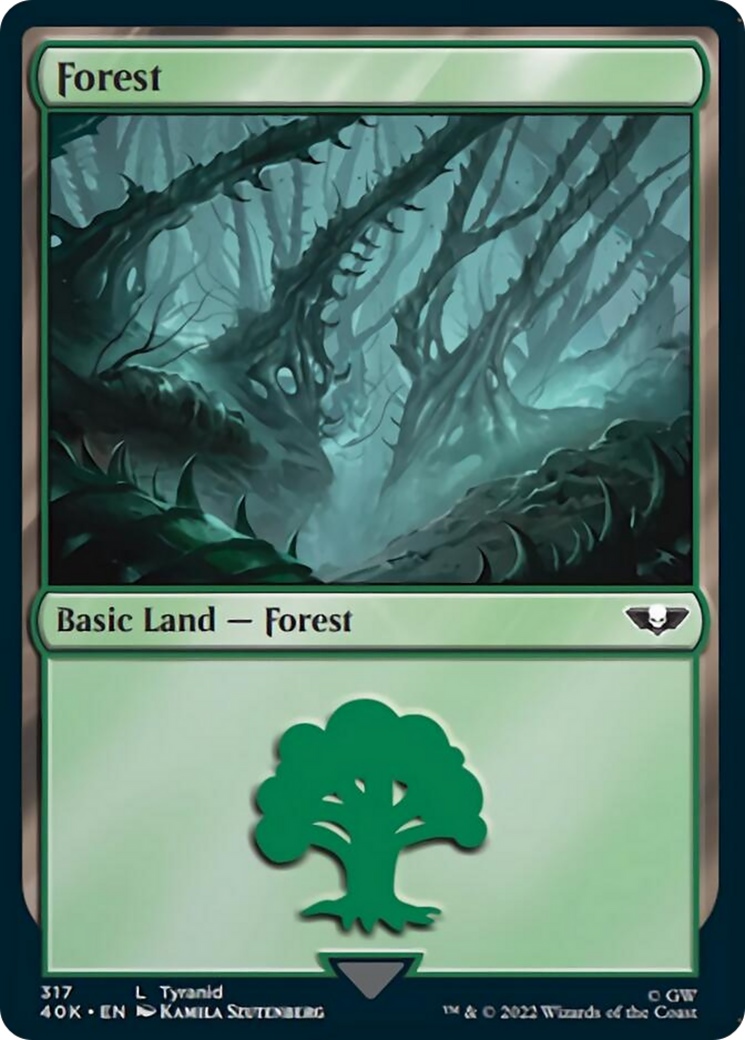 Forest (317) (Surge Foil) [Universes Beyond: Warhammer 40,000] | Cracking-Singles
